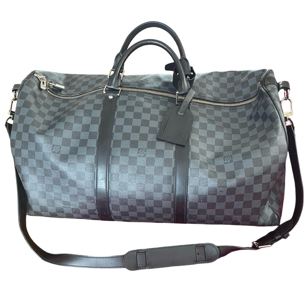 Louis Vuitton Duffle Bag

17.7 x 10.6 x 7.9 inches

Coated Canvas
Leather trim